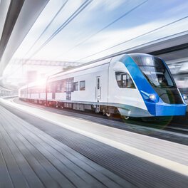 A train pulls into a railway station