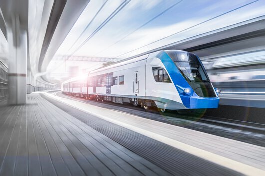 A train pulls into a railway station