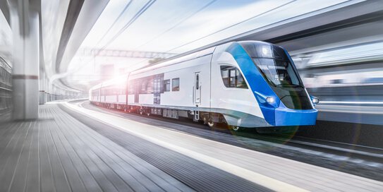 A train pulls into a railway station