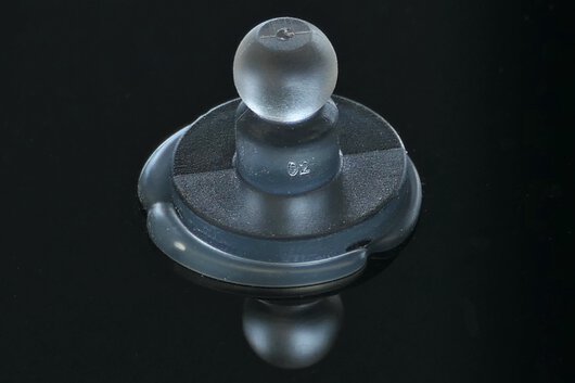 ONSERT® ball stud adhered on glass