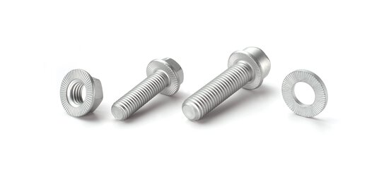 The self-locking nut, screws and washer next to each other.