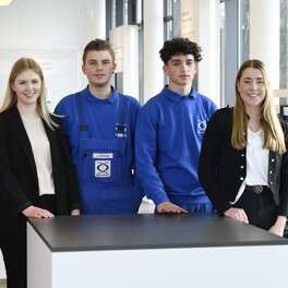 Photo of five Böllhoff apprentices in different disciplines
