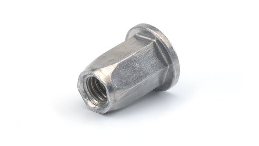 Image of an open RIVKLE® blind rivet nut made from steel, with hexagonal shaft and flat head