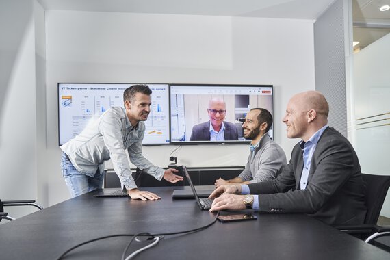 Markus, Marcel and Stephan in a video call with Jens