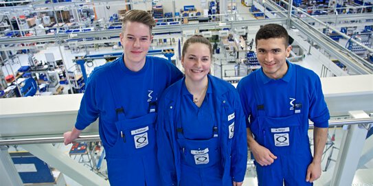 Photo of three technical apprentices at Böllhoff