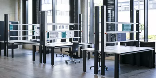 Modern learning tables for electrical training at the new Bildungscampus Böllhoff training and further education centre in Bielefeld.